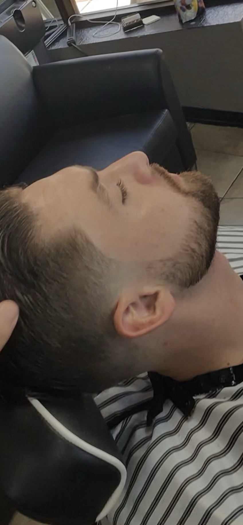 Slick comb-over fade